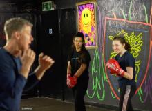 Simon Perry plus 2 students boxing