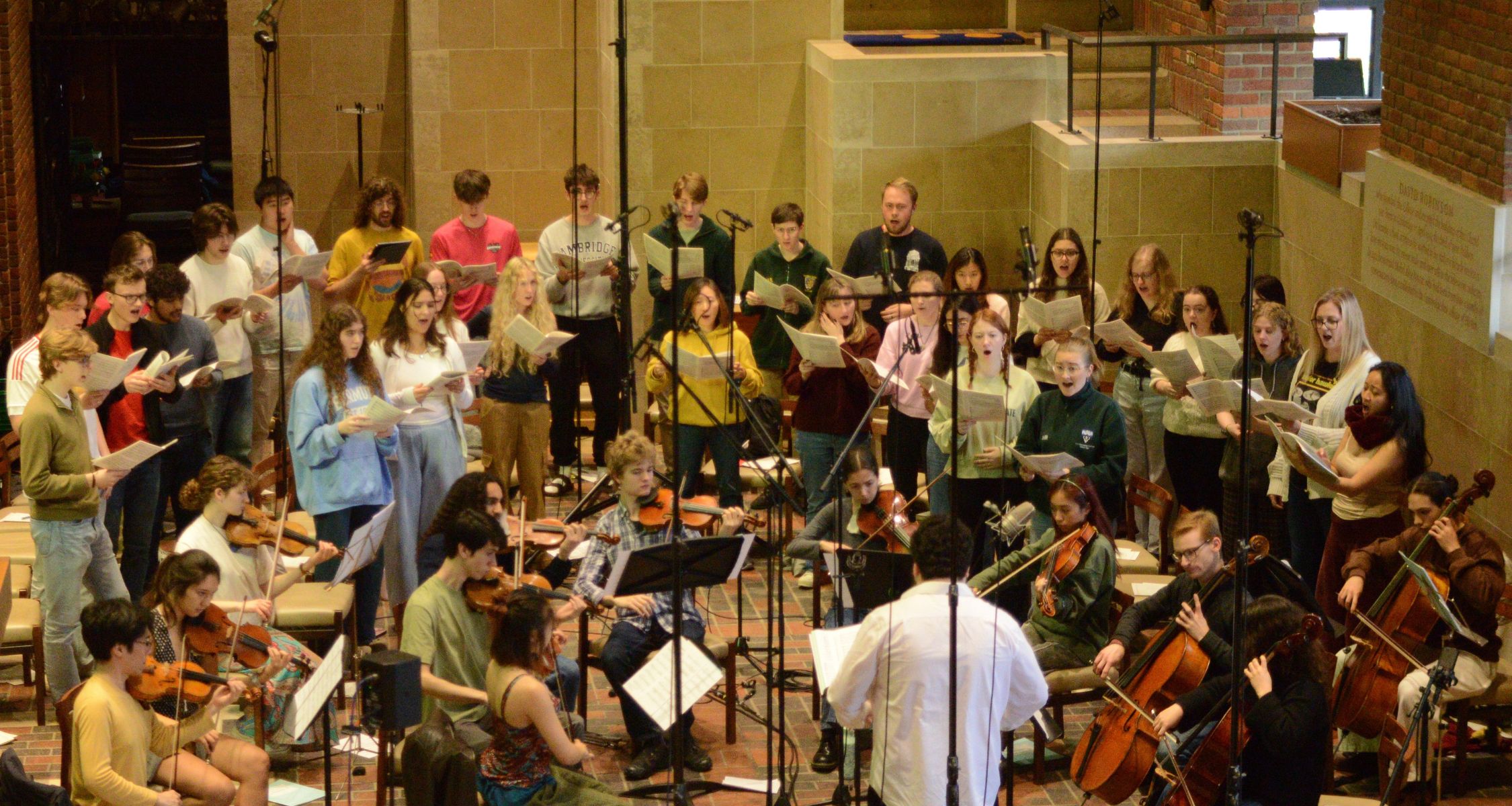 Students singing and playing music in the Chapel