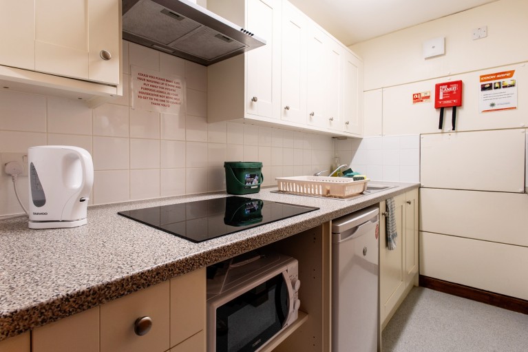 Example of a Staircase Kitchen