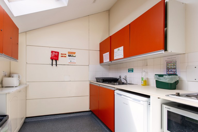 Example of a Staircase Kitchen