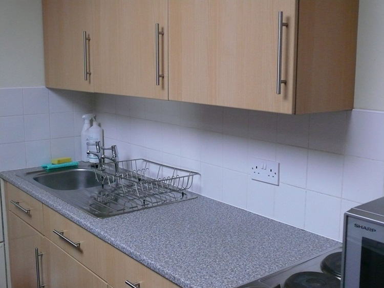 Example of a Staircase Kitchen