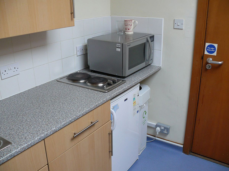 Example of a Staircase Kitchen