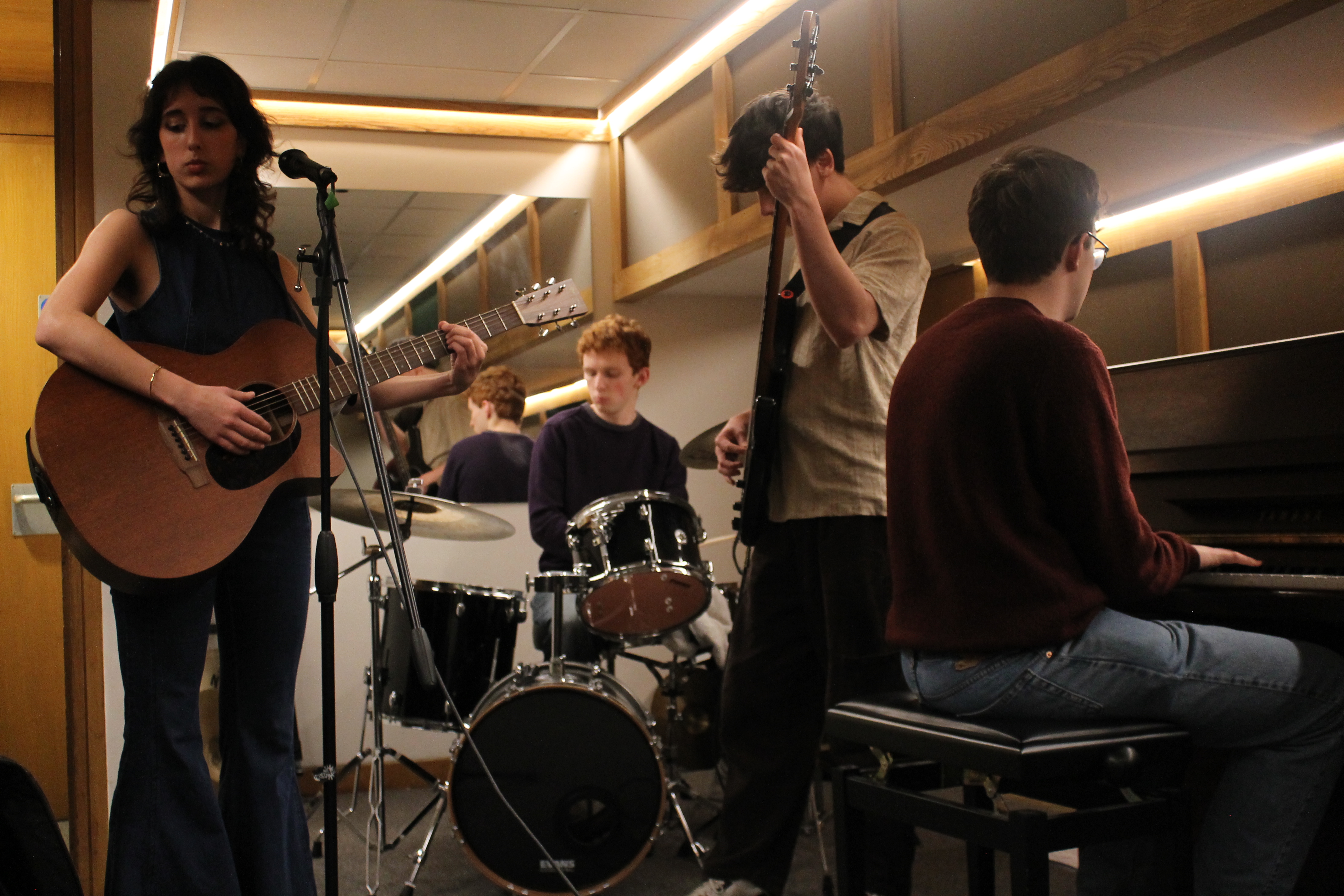 Ava, Robin and band rehearsing