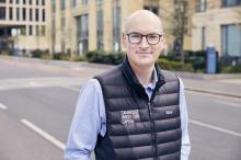 Dr Andrew Williamson standing in a road