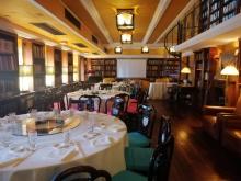 A room in a historic building of the China Club in Hong Kong set up for a dinner