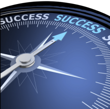 Illustration of a compass pointing towards the word "success"